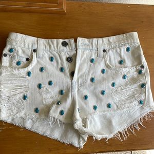 Carmar white jeans shorts w/ turquoise pendants
